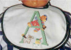 bavoir ourson d'Antoine